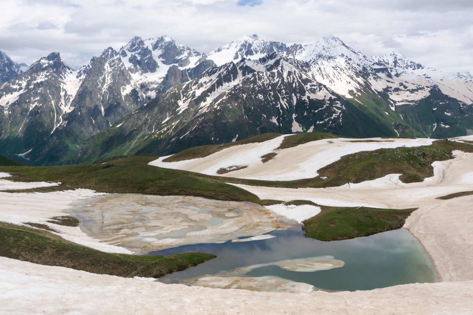 Koruldi Lake overlooking Mestia in June, still half covered with ice